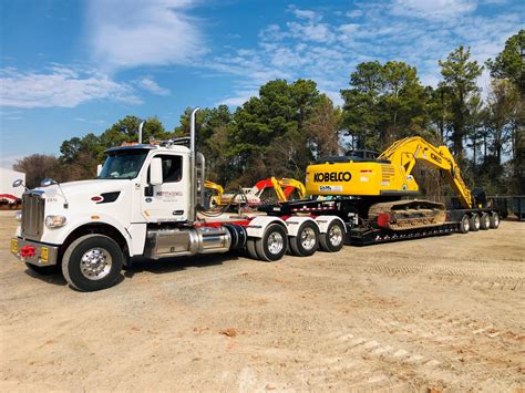 mini excavator hauling|heavy equipment haulers trucking companies.